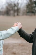 Photo of two people shaking hands